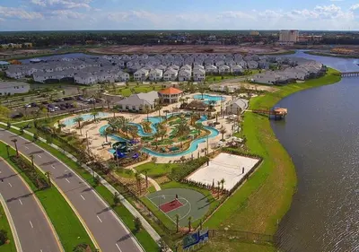 an aerial view of a resort by the water at In-Home Arcade, Themed Bedrooms, Resort Lazy River in Kissimmee