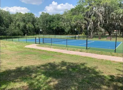 a couple of tennis courts in a park at Modern Guesthouse near MCO in Kissimmee