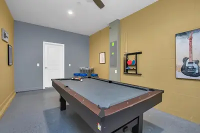 a billiard room with a pool table in it at Escape to a 5 Bedroom Villa in Paradise 6316 in Kissimmee