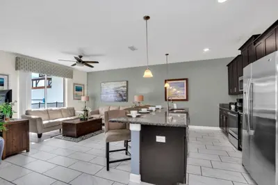a kitchen and living room with a living room at Modern 4 Bedroom Villa near Beach Shopping 6335 in Kissimmee