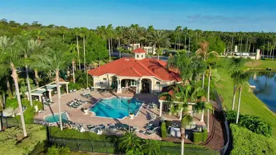 an aerial view of a resort with a swimming pool at 5-Star Orlando Townhome 6423 - Resort Amenities Near Disney in Kissimmee