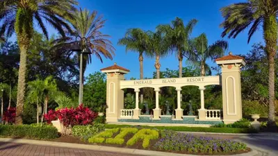 a gazebo in a park with palm trees at Stay Near Disney at Orlando Townhome 6444 Sleeps 8 in Kissimmee
