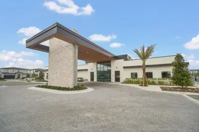 a large office building with a parking lot at Orlando Villa 6401 - Dream Stay at Paradiso Resort in Orlando