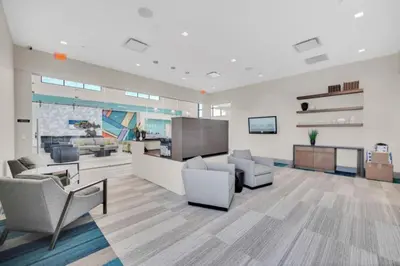 a lobby with couches and chairs in a building at Orlando Villa 6401 - Dream Stay at Paradiso Resort in Orlando