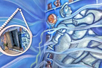 a painting on a wall with a mirror at Orlando Villa 6227: The Secret to Your Dream Resort Holiday in Kissimmee