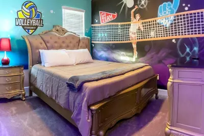 a bedroom with a bed in a room with a wall at Perfect Mansion on Veranda Palms Orlando Mansion 5379 in Kissimmee