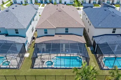 an aerial view of a house with a roof at Beautiful Mansion with first class amenities on Solara Resort Orlando Mansion 5715 in Orlando