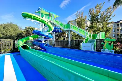 a water slide at a water park at The Perch-2 Miles from Disney, Movie Theatre & Water Park in Orlando