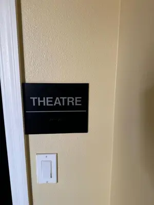 a sign on a door with theate on it at Family stay Near Disney in Kissimmee