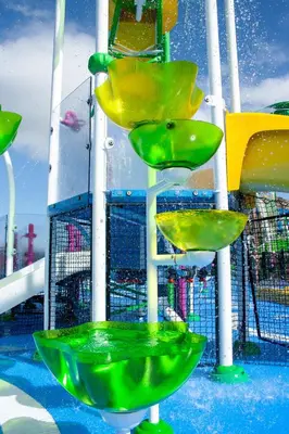 a water slide with green bowls on a roller coaster at Cozy 3 Bedroom Haven in Orlando6497 in Orlando