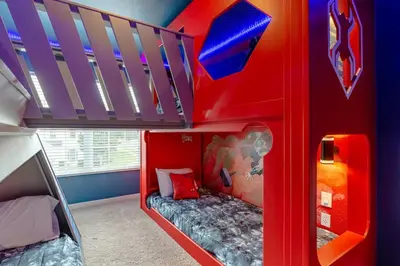 a kids room with a bunk bed and a red room at Charming Orlando Villa with 5 Bedrooms6499 in Orlando