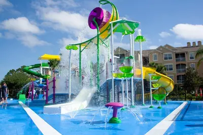 a pool with a water park with a water slide at Orlando Dream Home - 4 Bed Villa6501 in Orlando
