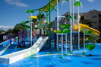 a water park with a water slide and a water slide at Orlando Oasis: 5 Bedroom Villa6502 in Orlando