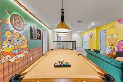 a pool table in a play room with a billiard at 2869 Epic Themed Mega Home at Storey Lake 7DB in Kissimmee