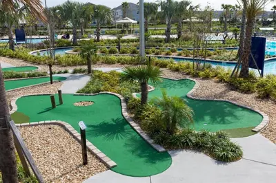 an image of a golf course at a resort at 4Q/3B Storey Lake Resort, melhor localização! in Kissimmee