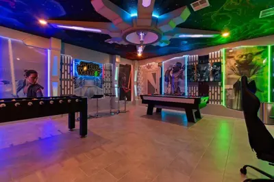 a room with a pool table and a ping pong ball at Top Luxury Villa Storey Lake mins to Disney in Kissimmee