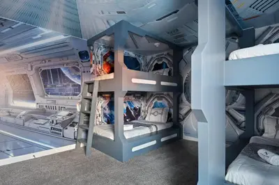 a room with two bunk beds in an airplane at Epic Family Getaway: Themed Villa Near Disney ! in Kissimmee
