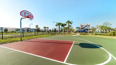a basketball court with a basketball hoop at Epic Family Getaway: Themed Villa Near Disney ! in Kissimmee