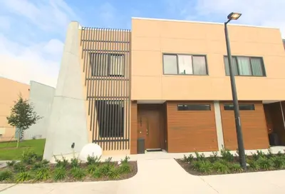 a building with a street light in front of it at NEW Luxury Oasis at Magic Village in Kissimmee