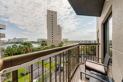 a balcony with a view of a building at Cozy Lakeview Getaway Near Universal Studios 2602 in Orlando