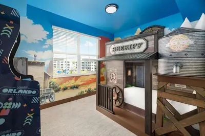 a childs bedroom with a train themed room at Villatel Orlando Resort, Apartments by Marriott Bonvoy in Orlando