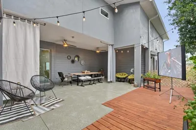 a patio with a table and chairs and a table and a table at Great Outdoor Area in Orlando