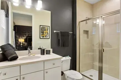 a bathroom with a toilet and a sink and a shower at The Nicklaus View Haven-TB007 in Orlando