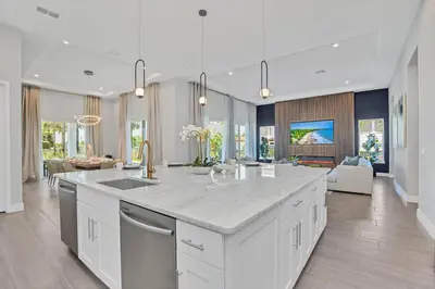 a large kitchen with a large island in a room at The Luxurious Bear's Den Estate-TB009 in Orlando