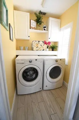 a laundry room with a washer and dryer at Best deal on Windsor Palms South facing pool in Kissimmee