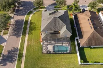 an aerial view of a house with a roof at Ruby Reds Escape in Kissimmee