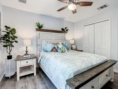 a bedroom with a bed and a ceiling fan at Hogwarts Escape: Magical Retreat Near Disney in Kissimmee
