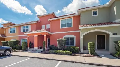 a house with a car parked in front of it at CUP8946 in Kissimmee