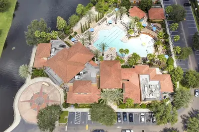 an overhead view of a house with a swimming pool at 12538 INTERNATIONAL DRIVE #C303 ORLANDO 2BED in Orlando