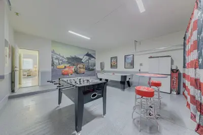 a gaming room with a ping pong table and a ping pong tablektop at 5 Bedroom private pool home in Veranda Palms in Kissimmee