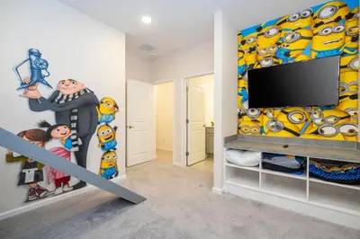 a childs room with a superhero mural on the wall at 5761 HS - Spacious Luxury Villa in Paradiso Grande in Orlando