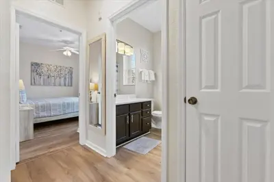 a white bathroom with a sink and a toilet at ALM2774-403 in Orlando