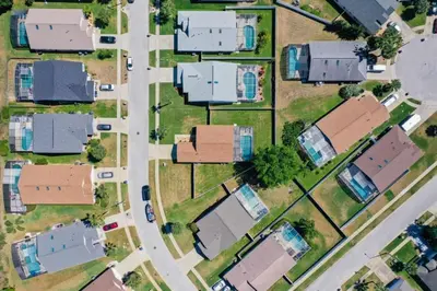 an aerial view of a residential neighborhood with houses at Relax Away Villa: Private Pool Home Near Disney in Orlando