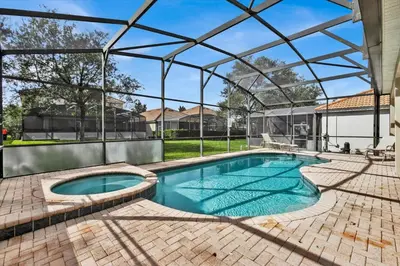 an indoor swimming pool with a glassconservatory at GRS7756 in Orlando