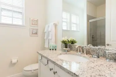 a bathroom with a sink and a toilet at Contemporary Disney VacationHome in Orlando