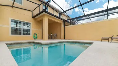 a swimming pool in a house with a glass ceiling at BCH3027 in Kissimmee