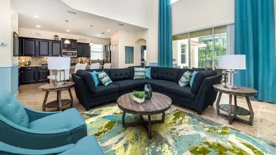 a living room with a couch and a table at BUC2979 in Kissimmee