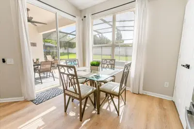 a dining room with a table and chairs at Windsor Palms Resort Vacation Home WP2209 in Kissimmee