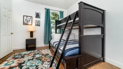 a bedroom with a bunk bed and a rug at Windsor Palms Resort Vacation Home WP2243 in Kissimmee