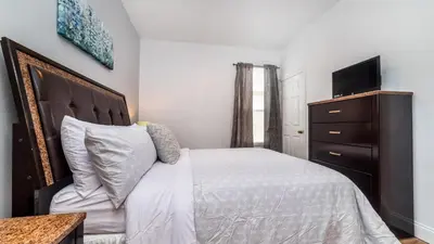 a bedroom with a large bed and a dresser at Windsor Palms Resort Vacation Home WP2243 in Kissimmee