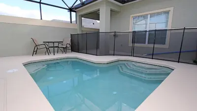 a swimming pool on top of a house at CAL8967 in Kissimmee
