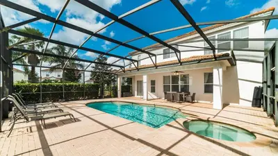 a patio with a swimming pool and a pergola at Huge 6BR Home in Windsor Hills Resort in Orlando