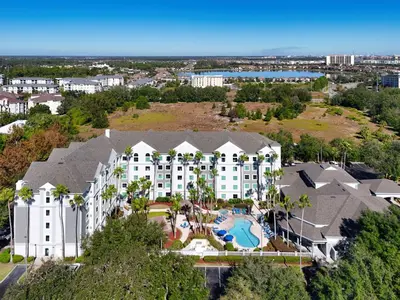 an aerial view of a resort with a pool at Disney Accessibility Star Wars Vacation Apartment Near Parks in Orlando
