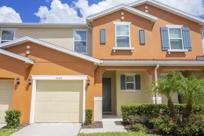a house with an orange at Villa Compass- Compass Bay in Kissimmee