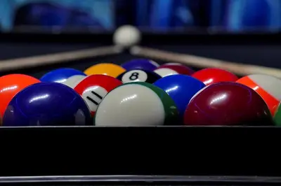 a group of billiard balls in a pool table at 261 LASSO DRIVE 6BED in Orlando