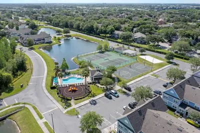 an aerial view of a park with a tennis court at 4005 SAN SABASTIAN DRIVE 3BED in Kissimmee